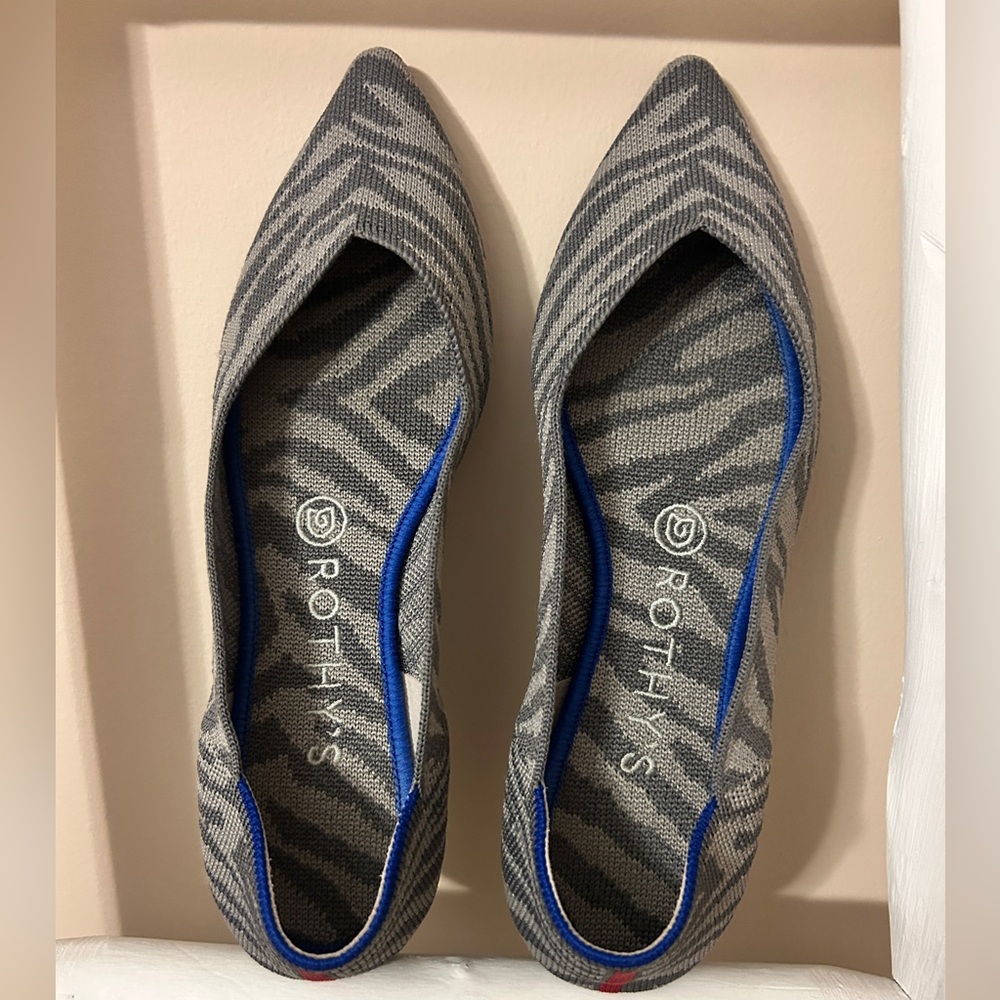 Rothy's Zebra Pattern Flats with Blue Trim
